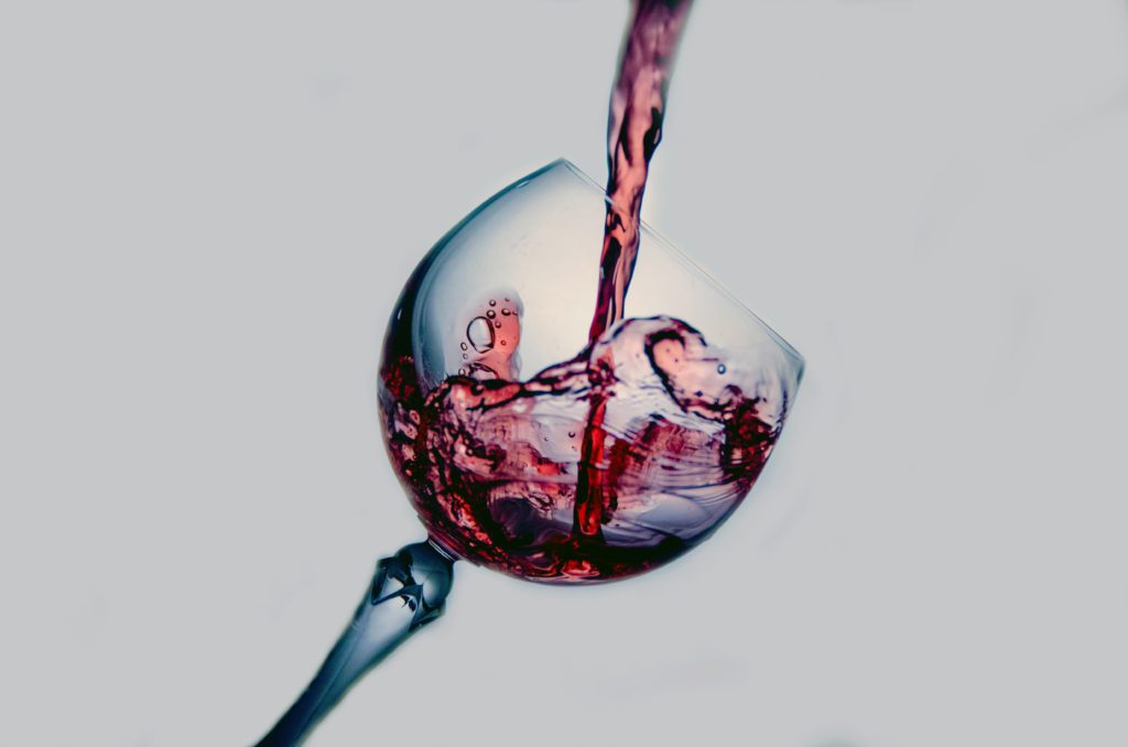 wine being poured into a glass