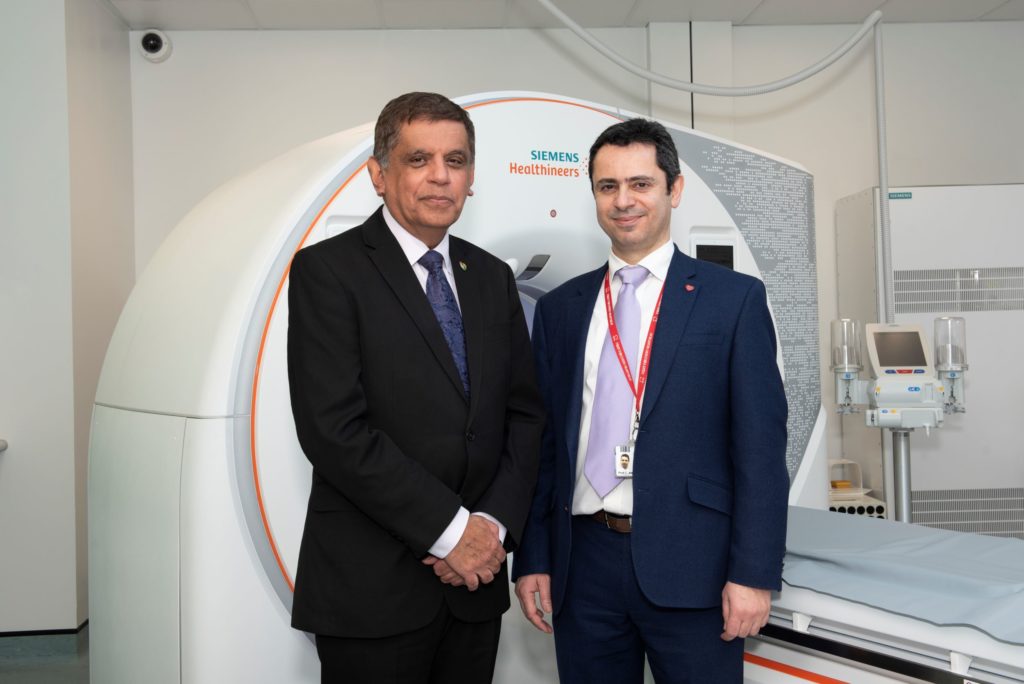 BHF Medical Director Professor Sir Nilesh Samani with AMIIC Director Professor Charalambos Antoniades in front of AMIIC’s photon-counting CT scanner