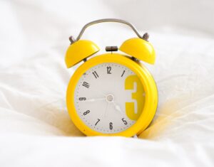 Bed alarm clock