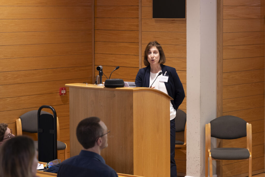 Joanna Snowball speaking at a lectern